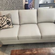 transitional leather cream sofa and 2 chairs