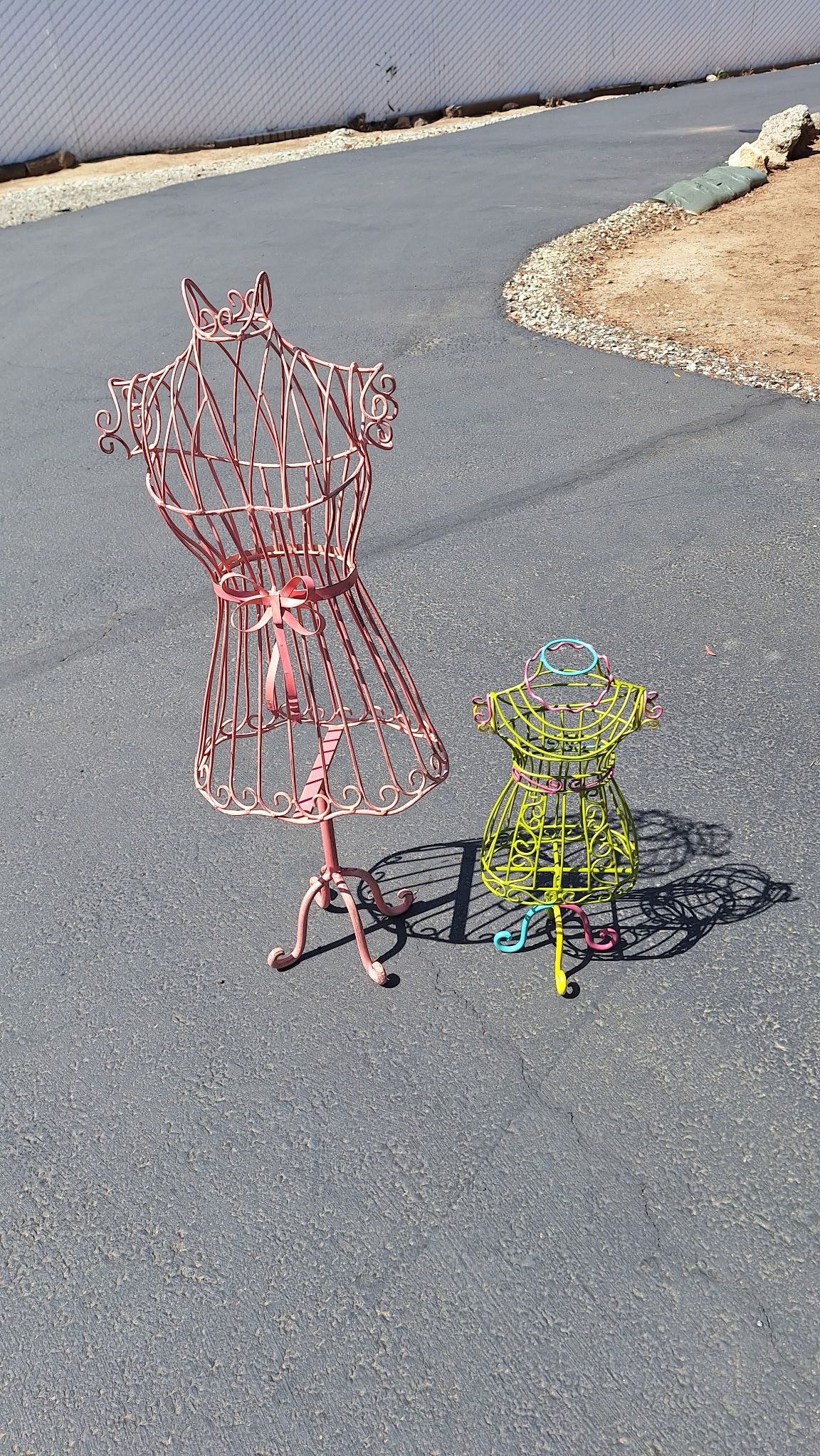 Metal Dress Form, which is a type of mannequin