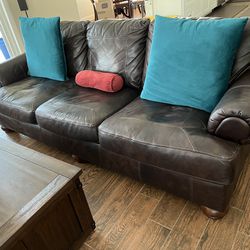 Leather Couch, Loveseat, Chair And Ottoman.