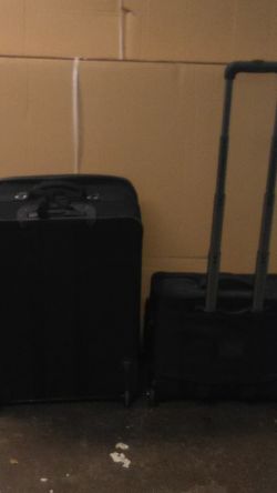American Tourister rolling suitcases
