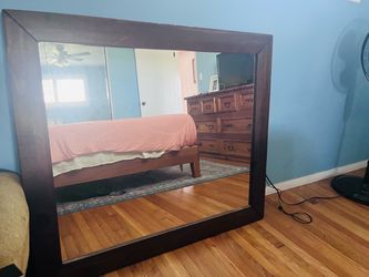 Mirror with wood frame