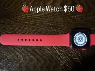 Apple Watch with Red Sport Band