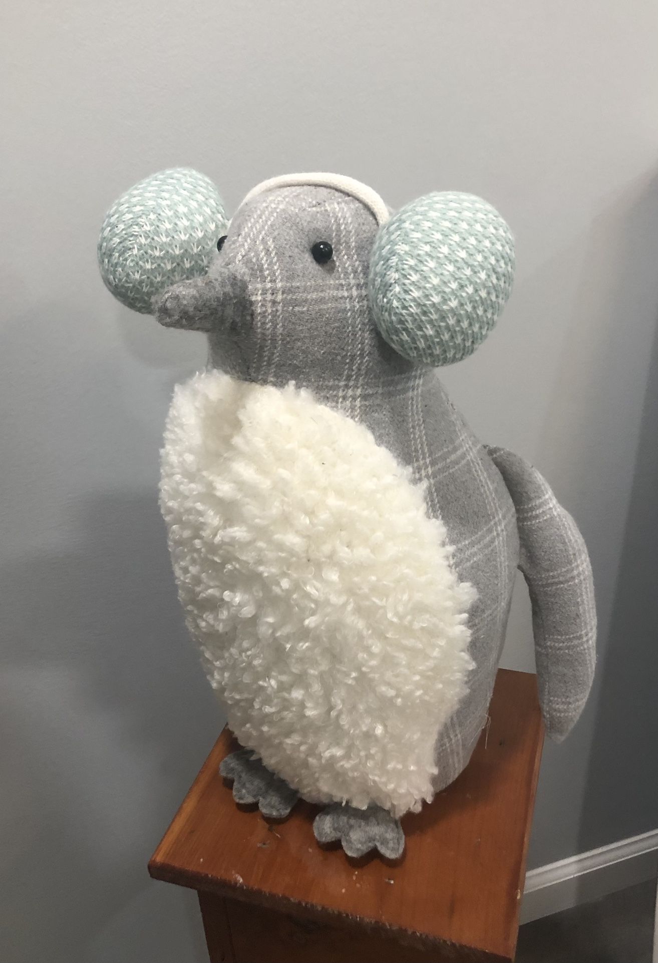 Plush Snow Penguin With Earmuffs And Weighted Bottom
