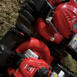 Two mowers Troy built personal pace bagger