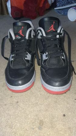 black and red jordan 4s size 7 women