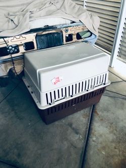 Large dog travel kennel. 24”x 30” x 36” $20