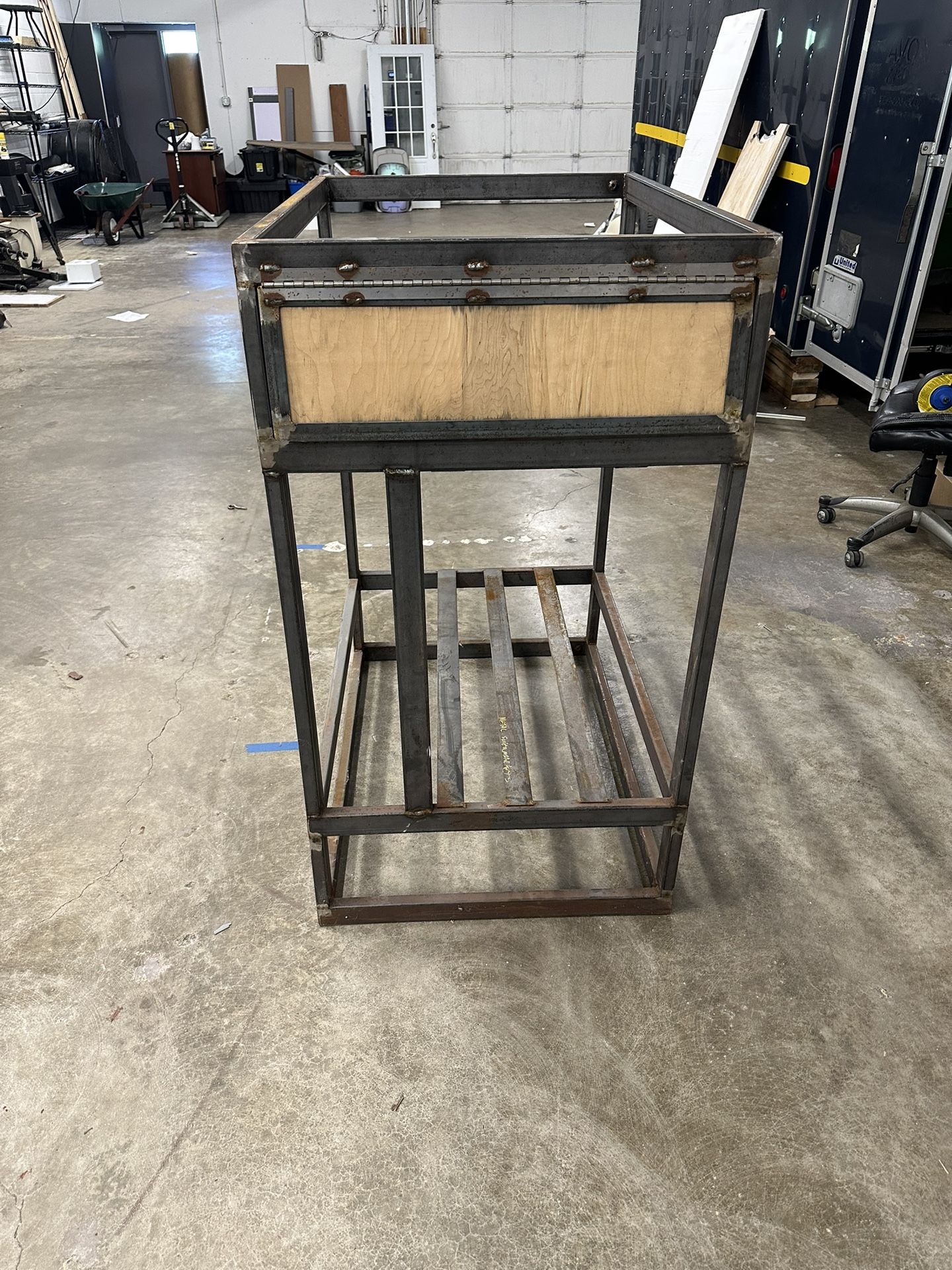 Welded metal cage. Thinking it can be used as is or broken down for parts.