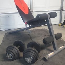 Adjustable sit-up bench with Set Of Adjustable Dumbells With 100lbs Of Weights..5lb-50lb dumbbells..