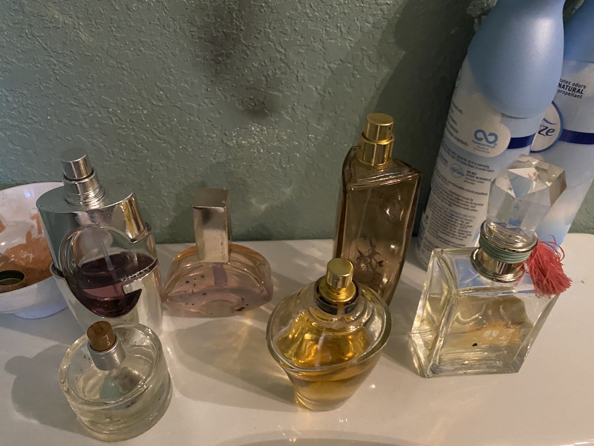 Woman’s perfume one like new others half serious interested just Calvin Klein cost like $70 please make a good offer for all