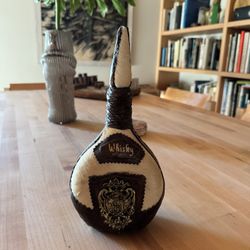 Hide And Leather Antique Whiskey Bottle  