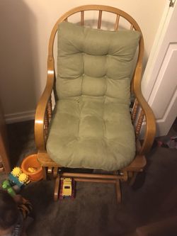 Rocking chair with green cushion