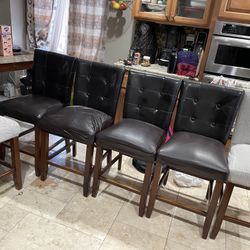 8  -21” High Chairs  Only 2 Chair Chairs Button Came Out Brown Color Put Covers On It As Seen In Picture 