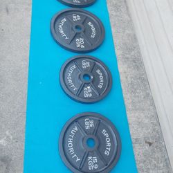OLYMPIC  WEIGHTS PLATES 45LBS,35LBS 