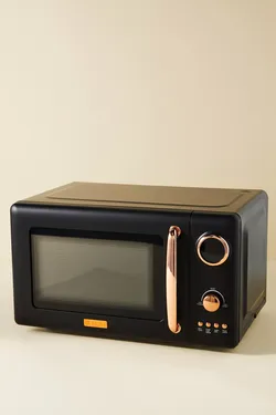 Haden 700-watt 0.7 cubic foot countertop microwave oven in black with copper accents