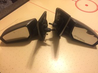 Powered side view mirrors