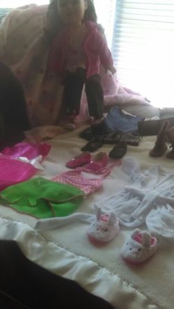 Used Madame Alexander 18' doll with clothes and shoes