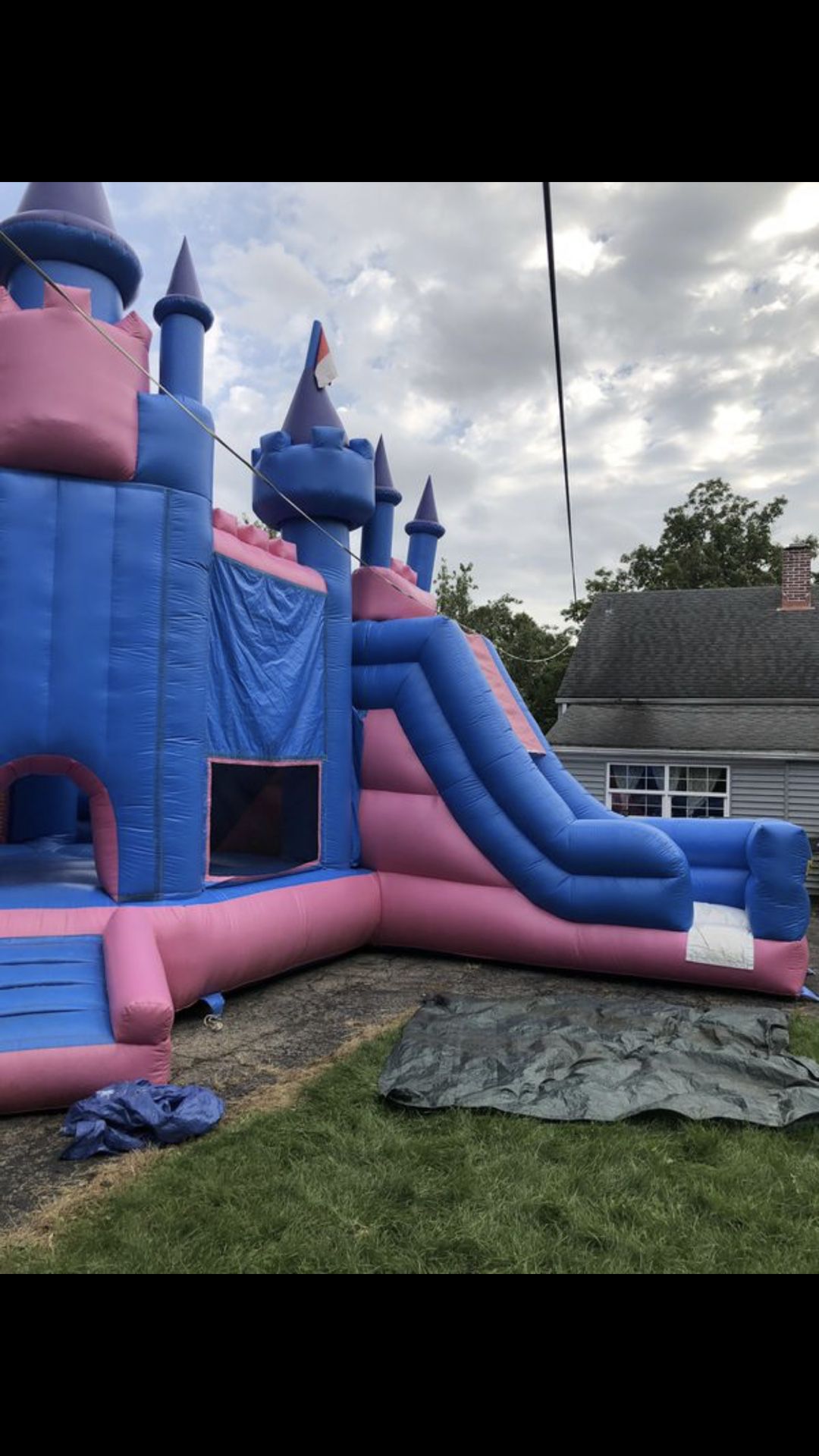 Large bouncy house with slide
