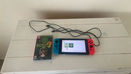 Nintendo switch V2 with game and charger