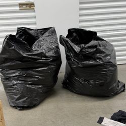2 Construction Bags Full of Clothes Polos 35shirts pants dresses