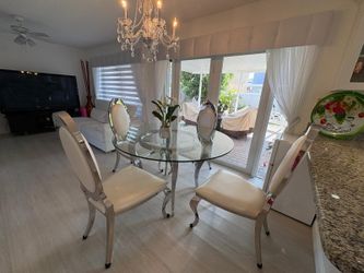 Glass dinner table and 4 chairs