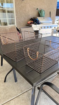 Vintage Sturdy metal basket with copper handles.