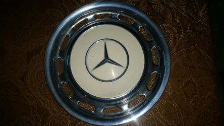 Three individual 1974-79 model Mercedes hubcaps