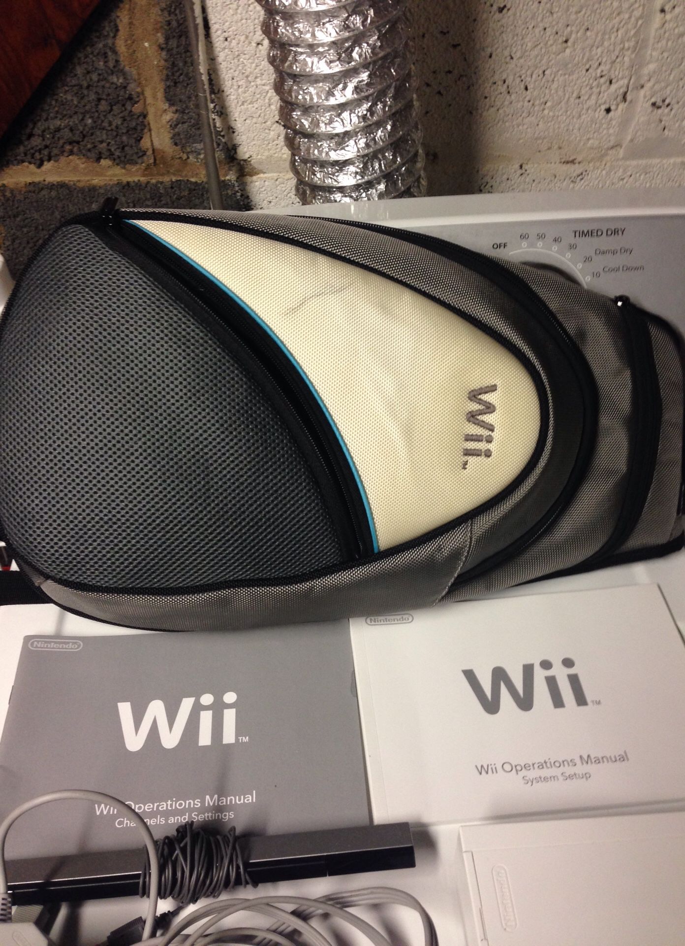 Nintendo wii with wii bag