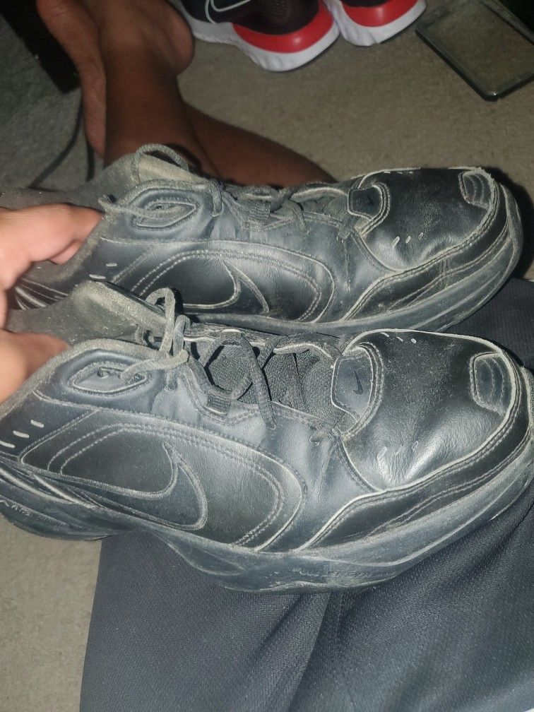 PREVIOUSLY WORN BLACK SHOES