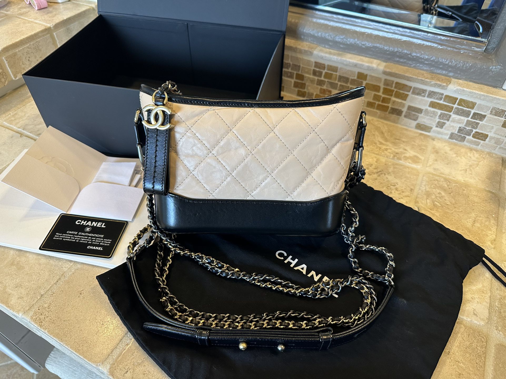 Chanel small beige and black gabrielle bag
