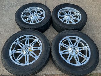 22x10 INCH FUEL OFF-ROAD RIMS WITH 325/55R22 TIRES
