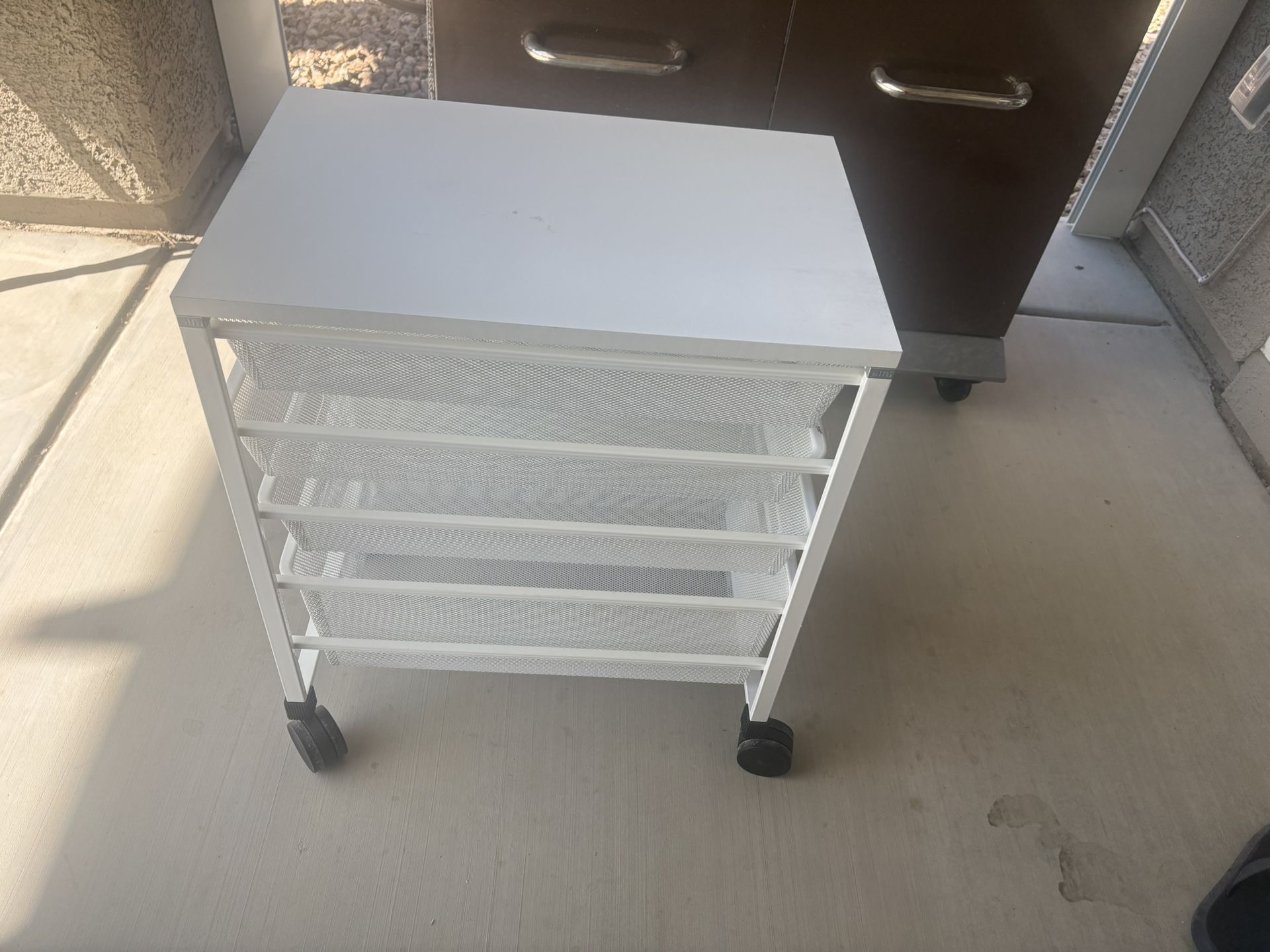 Containers and More Elfa Cart!  Marking on top, also the stoppers in the back of one of the drawers is missing! (Slides thru to the other side if you 