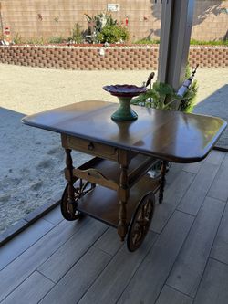 Beautiful Antique Rolling Folding Table.