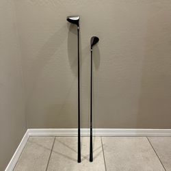 Bundle of driver and wood golf clubs