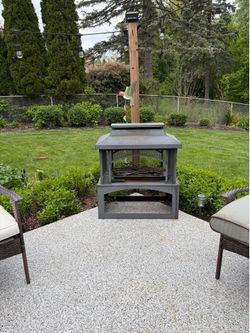 Outdoor wood burning fireplace