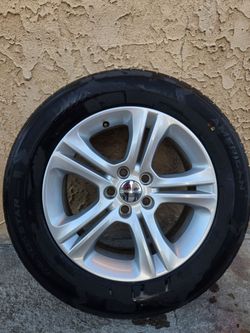 DODGE 215/65/17 set of rims with tires
