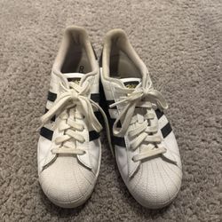 White Adidas Superstars