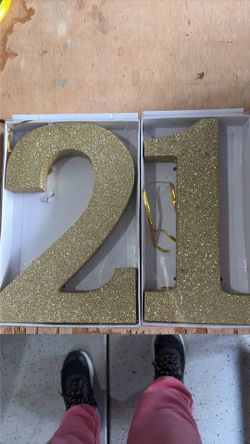 Gold Glitter Number 21 or 12 asking $10.00