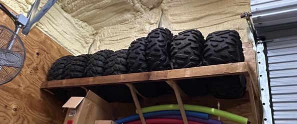 2 sets of stock Polaris tires and wheels
