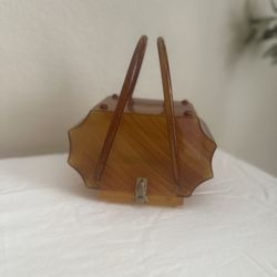 Llewellyn bake light lucite tortoise hand bag purse