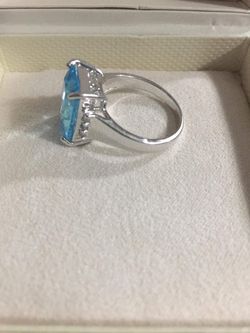 silver and blue gemstone ring