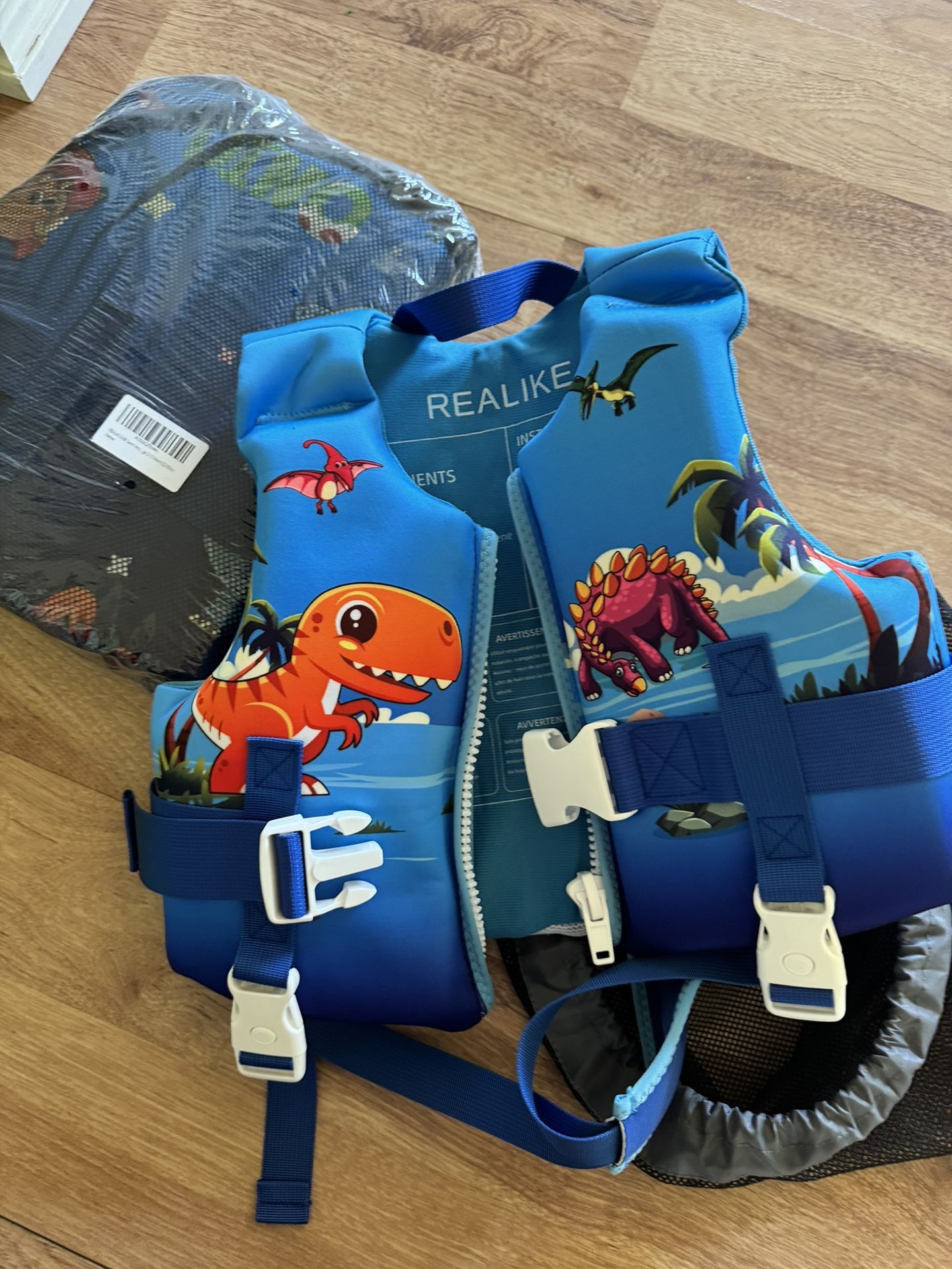 REALIKE Kids Swim Vest Toddler Floaties Adjustable Safety Strap Swimming Aids for Toddlers Children Float Swimsuit, Suitable for Age 2-10 Years/22-88l