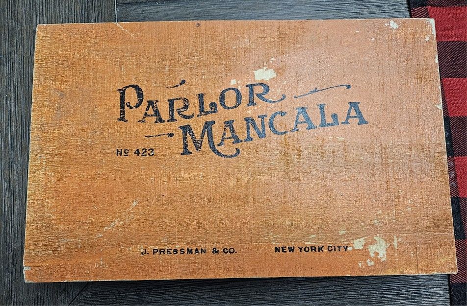 Mancala game - Wooden antique version