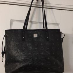 MCM Black Leather Tote Bag. Dimensions 14x17. Top measurement 17” and Bottom 14”
