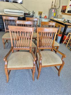 6 matching dining room chairs wooden good condition. About 15in to fabric seat, 43in to top of back. 23in wide 19in deep. $75 for the set
