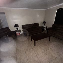 Black/brown Couches , Tables And Lamps 