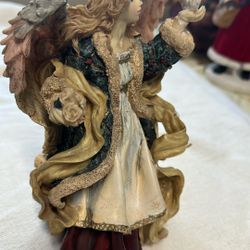 Ceramic angel Holding Bird