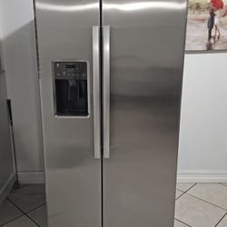 GE stainless steel side-by-side refrigerator with water and ice dispenser