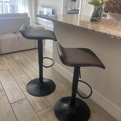 2 Black Adjustable Bar Stools 