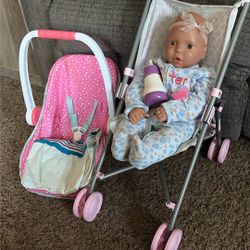 Newborn Size Baby Doll With Stroller Seat And Accessories