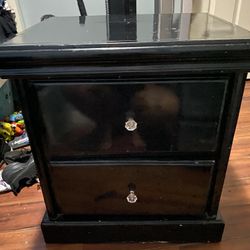black night stand with crystal handels 